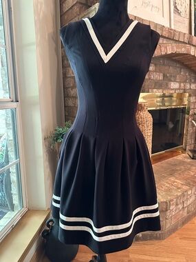 H&M Black Mini Dress with White V‑Neck and Hem Stripes